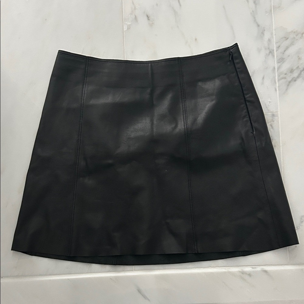 sleek and stylish, black leather mini skirt from Susan Monaco, trendy